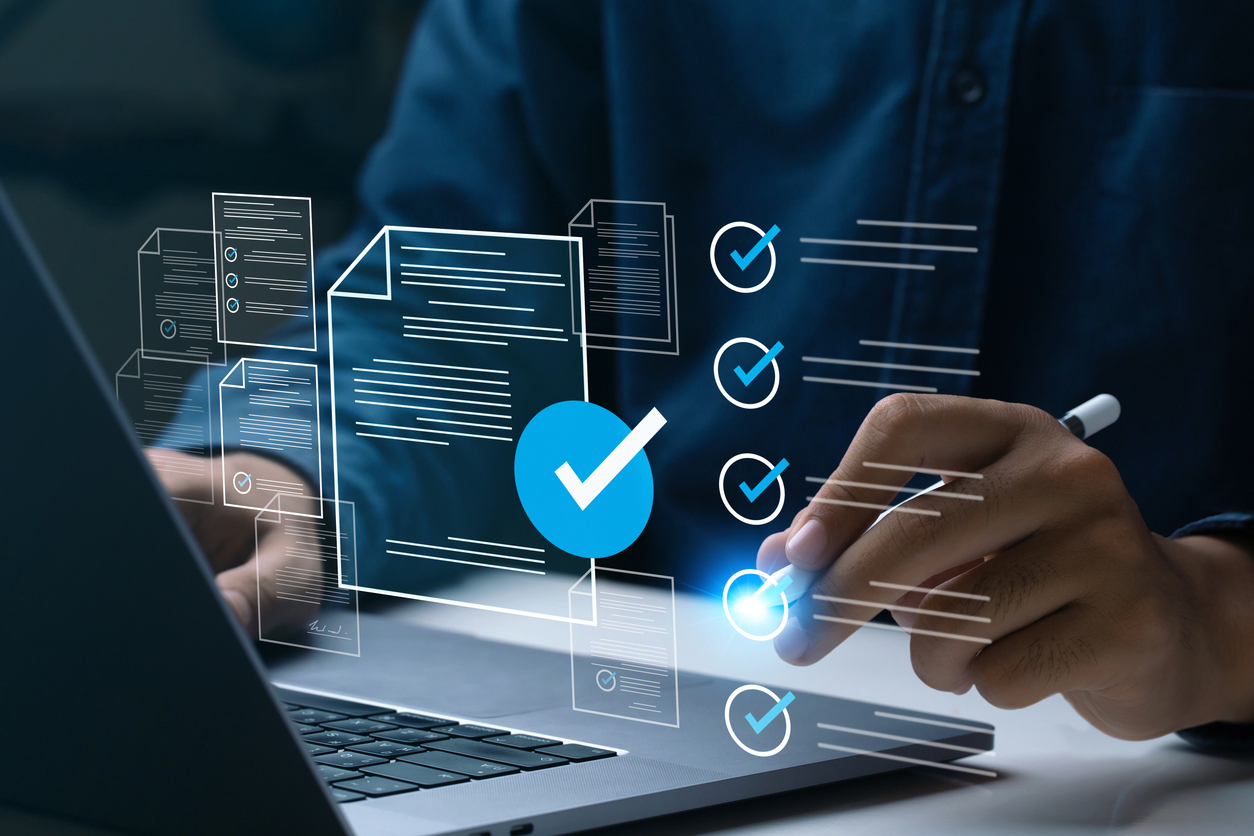 writing report on laptop computer